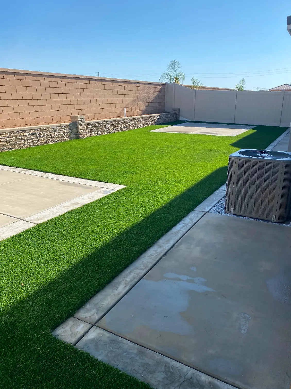 Pet-friendly artificial turf back yard in Perris, CA