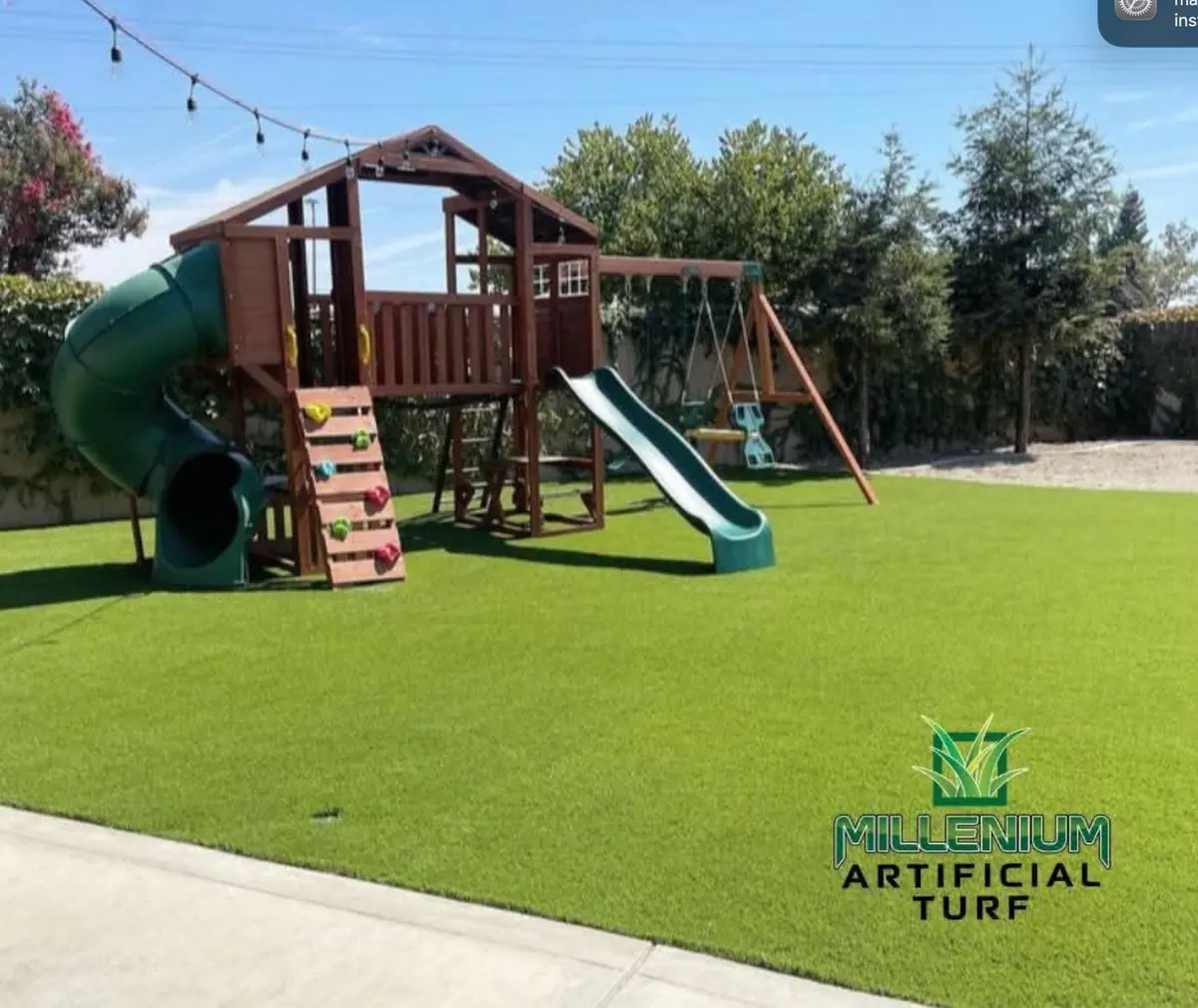 Playground turf installed under a swing set in Perris, CA