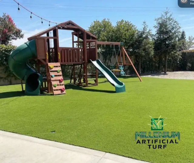 Playground turf under a swing set in Perris, CA