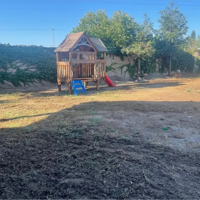Dirt back yard before turf in Perris, CA